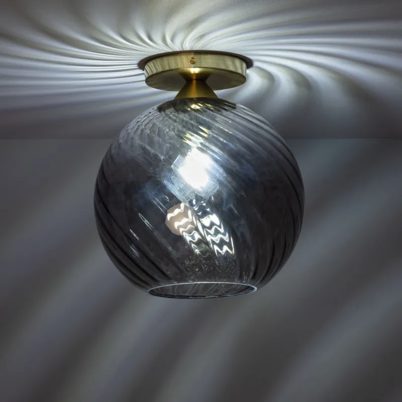 Plafonnier suspendu boule verre et socle fer doré culot e27