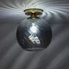 Plafonnier suspendu boule verre et socle fer doré culot e27