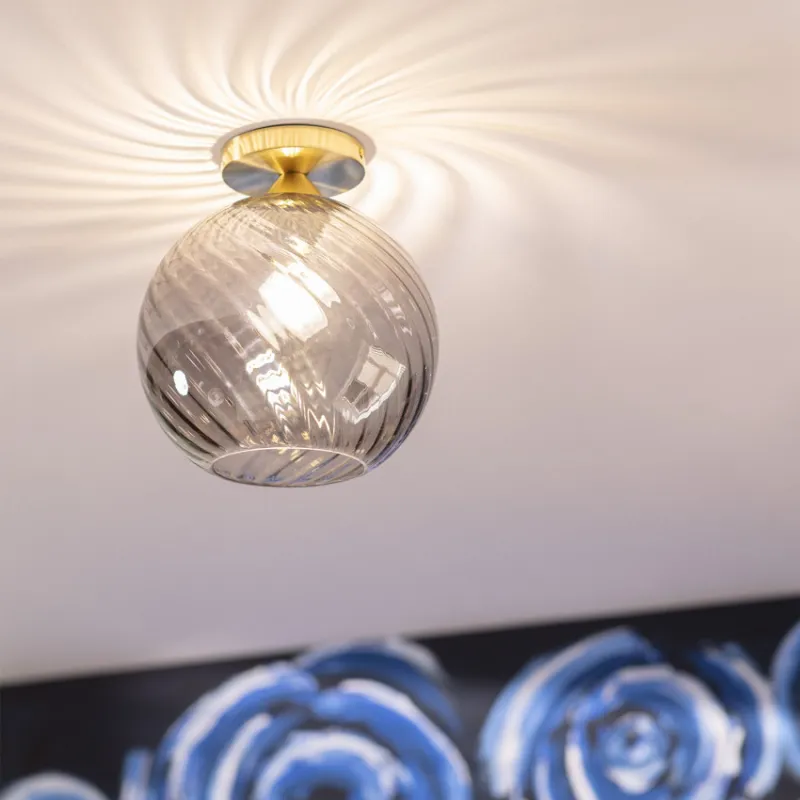 Plafonnier suspendu boule verre et socle fer doré culot e27