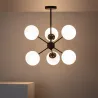 Plafonnier 4 têtes bras métal noir et boules verre culot e27